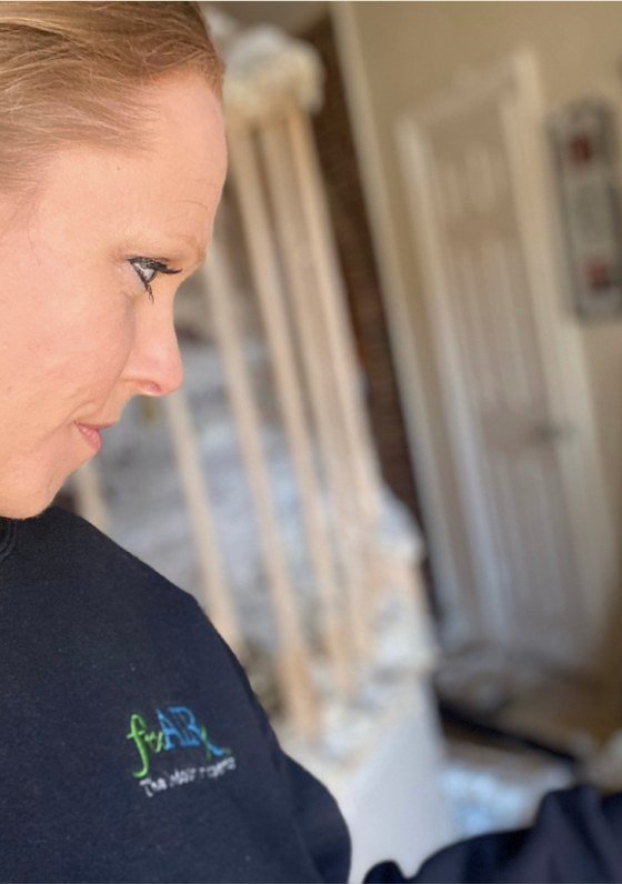 FixAIRx founder Wendy Michaelis performing a thermal-imaging assessment in the field